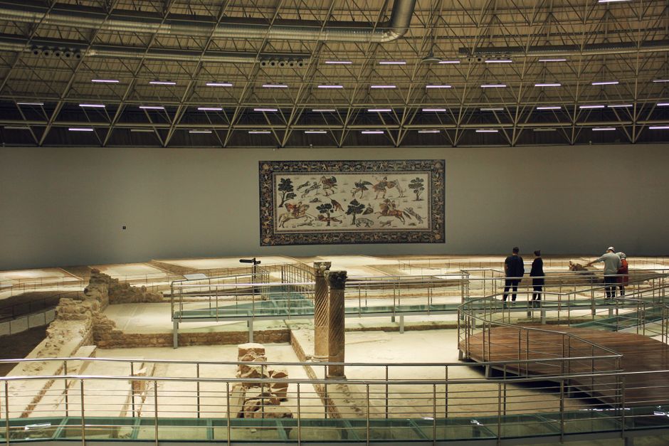 Explore the stunning Roman mosaic exhibit at the Şanlıurfa archaeological site in Turkey.